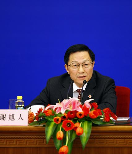 这是财政部部长谢旭人回答记者提问。新华社记者 陈建力 摄