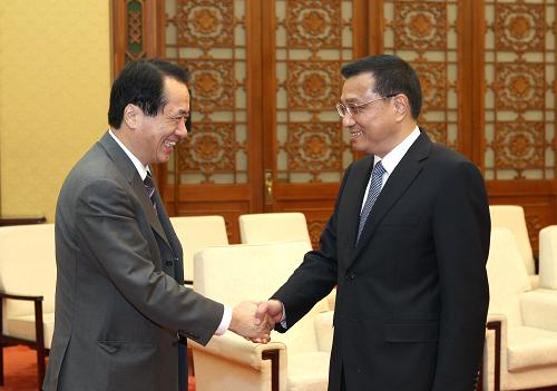 4月3日,国务院副总理李克强在北京人民大会堂会见来华出席第三次中日财长对话的日本副首相兼财务大臣菅直人。新华社记者 马占成 摄