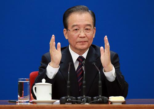 3月14日,国务院总理温家宝在北京人民大会堂与中外记者见面,并回答记者提问。 新华社记者 庞兴雷 摄